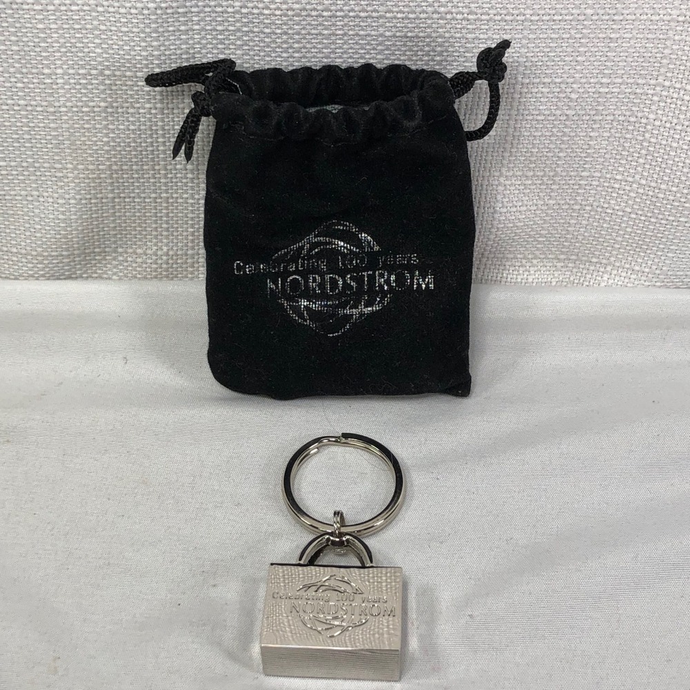 Nordstrom Celebrating 100 Years Silver Shopping Bag Keychain with Pouch